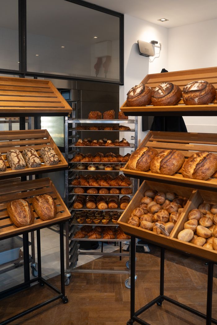 Crafting Captivating Headlines: Your awesome post title goes here Diverse assortment of artisanal breads displayed in a Berlin bakery interior.